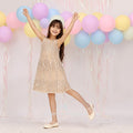 Glitzerndes cremefarbenes Kleid